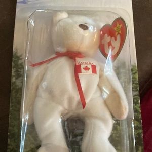 Collectible MAPLE THE BEAR!  Has not been taken out of package!   (NWOT)